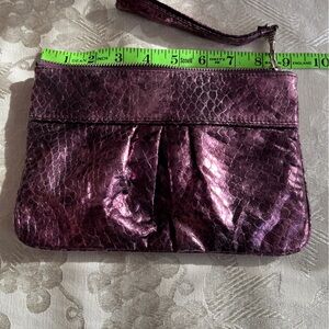 Evening bag, snakeskin styling in purple